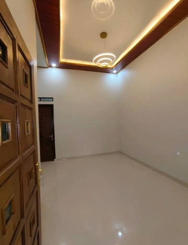 House for Sale in Graha Melasti, Bekasi with Garden and Carport 4