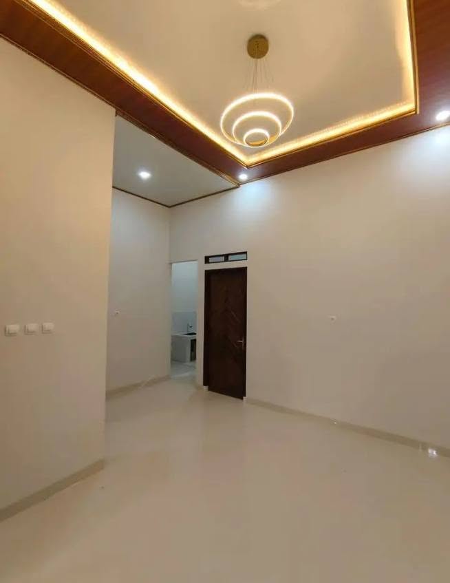 House for Sale in Graha Melasti, Bekasi with Garden and Carport 8