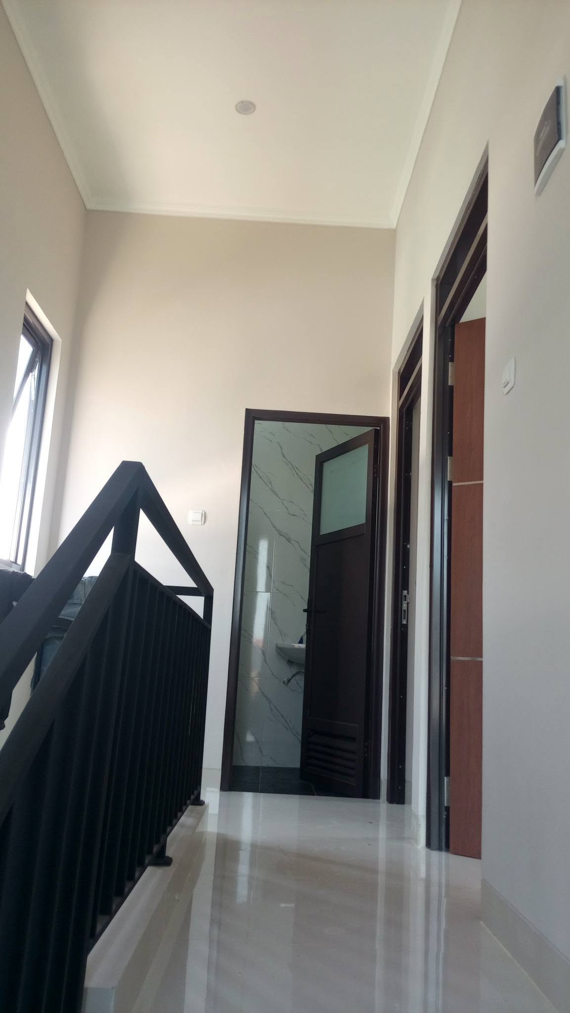 3-Bedroom House for Sale in Munjul, Cipayung, East Jakarta with Smart Lock and Balcony 5