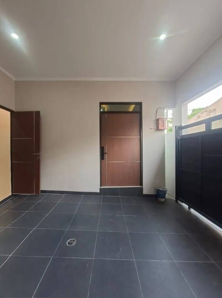 3-Bedroom House for Sale in Munjul, Cipayung with Balcony and Carport 2