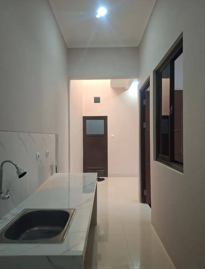 3-Bedroom House for Sale in Munjul, Cipayung with Balcony and Carport 5