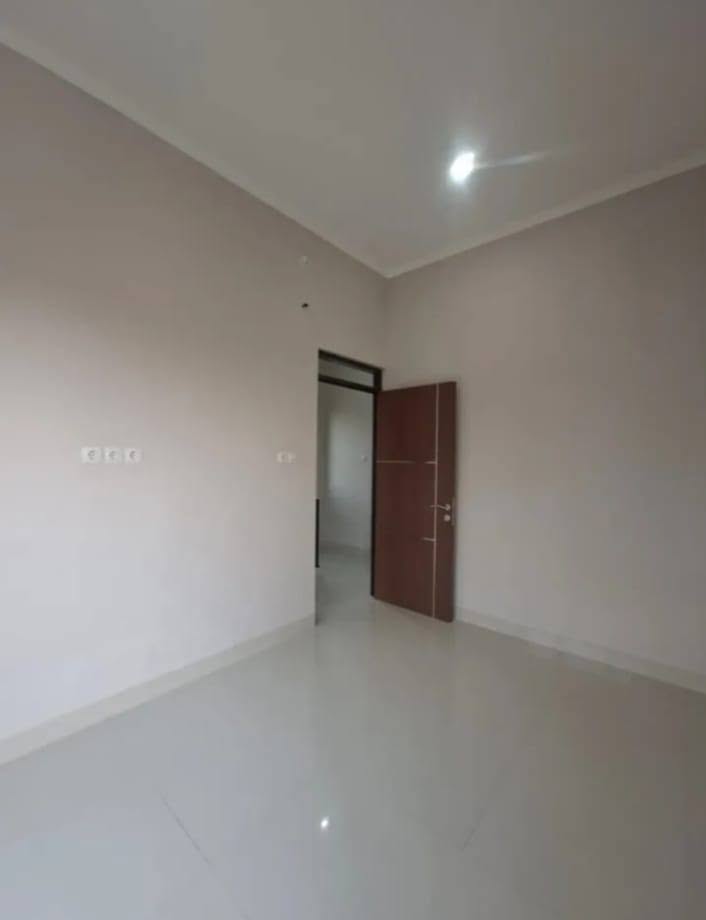 3-Bedroom House for Sale in Munjul, Cipayung with Balcony and Carport 6