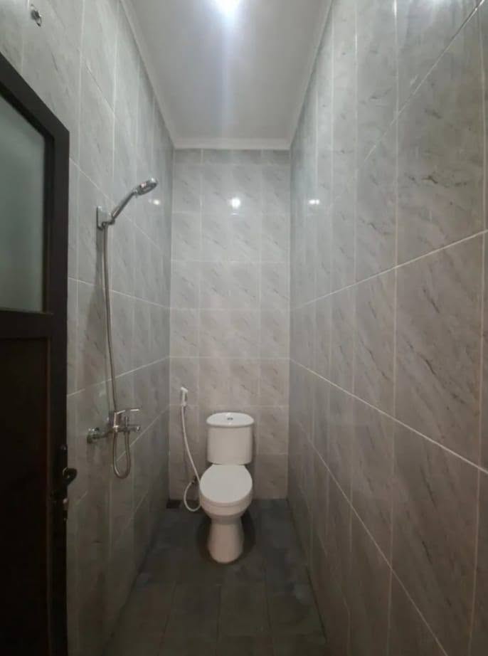 3-Bedroom House for Sale in Munjul, Cipayung with Balcony and Carport 7