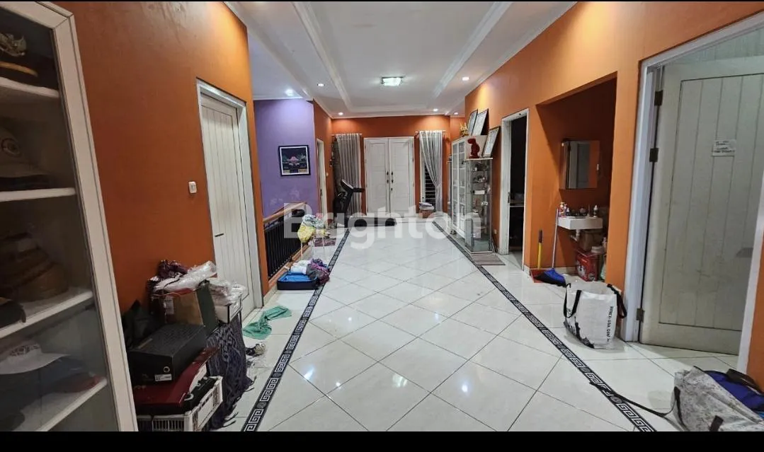 Spacious 6-Bedroom House for Sale in Cengkareng Timur with Terrace and Garage 3